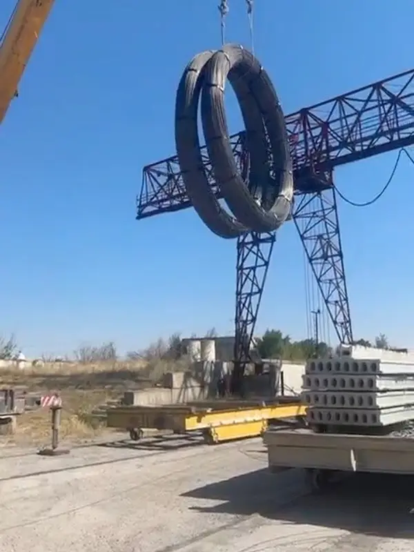 Бухталарды кранмен тиеу